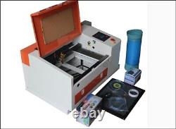 Machine de gravure et de découpe au laser CO2 50W avec table électrique montante et descendante Usb Pbu